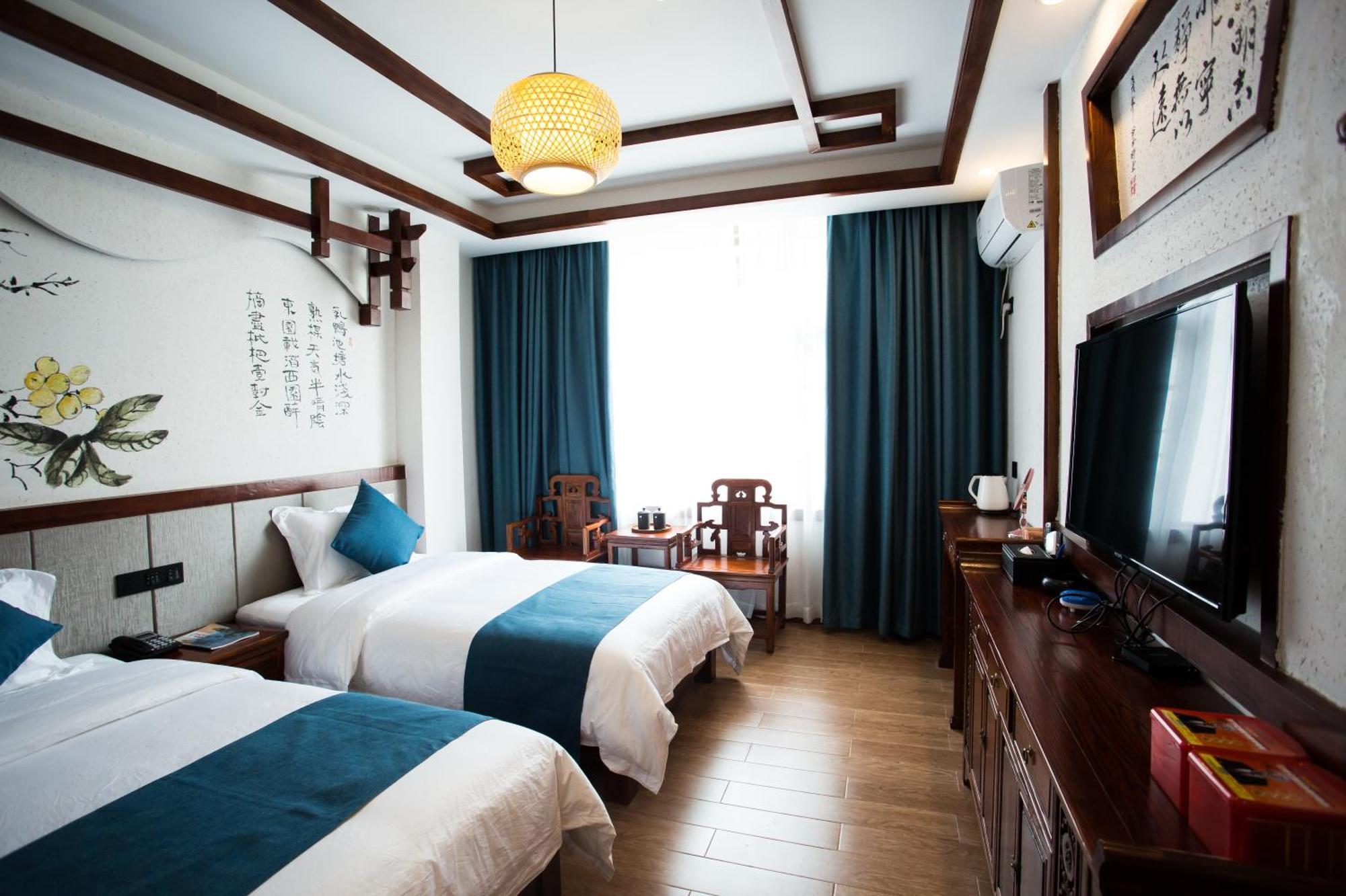 一树一花客栈眷恋店 Apartamento Wulingyuan Exterior foto